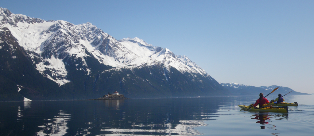 Paddle south from the Haines Peninsula toward Eldred Rock